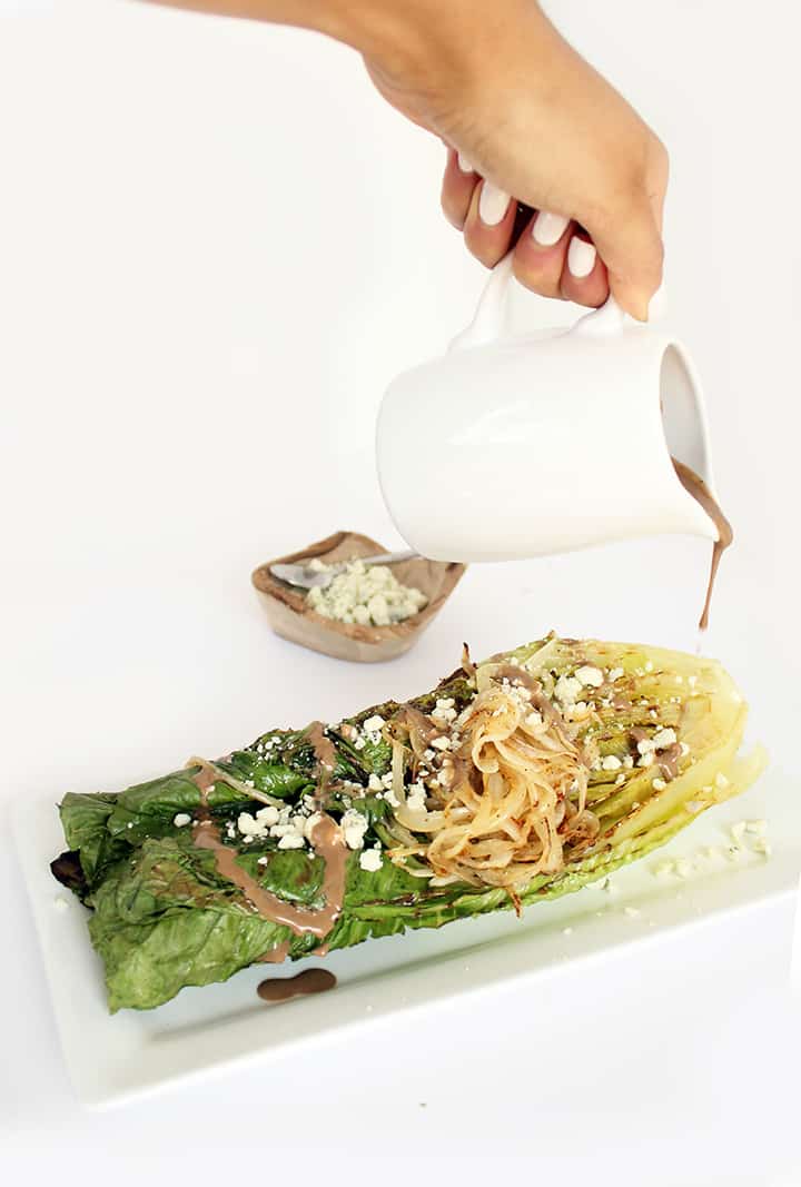 Grilled Romaine with Caramelized Onion Noodles, Blue Cheese and Greek Yogurt Balsamic Dressing